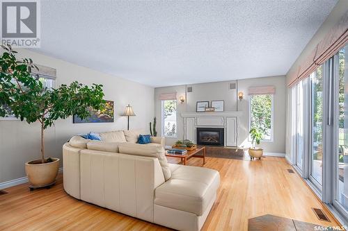 1605 Adelaide Street E, Saskatoon, SK - Indoor Photo Showing Living Room With Fireplace