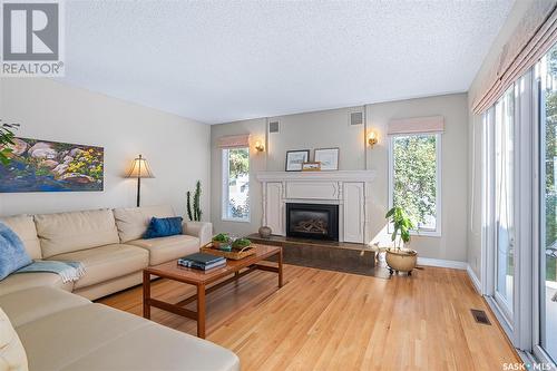 1605 Adelaide Street E, Saskatoon, SK - Indoor Photo Showing Living Room With Fireplace