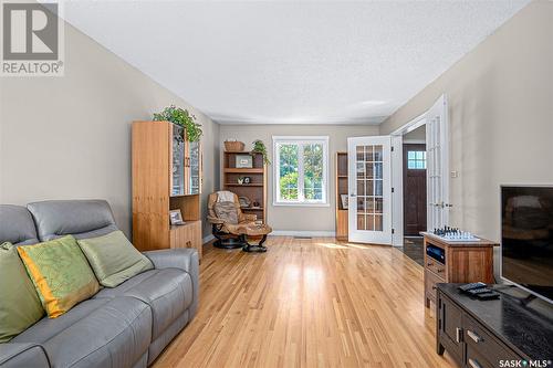 1605 Adelaide Street E, Saskatoon, SK - Indoor Photo Showing Living Room With Fireplace