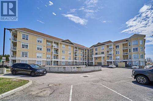 315 - 21 Brookhouse Drive, Clarington (Newcastle), ON - Outdoor With Balcony With Facade