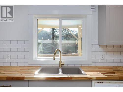 248 Terrace Drive, Kelowna, BC - Indoor Photo Showing Kitchen With Double Sink