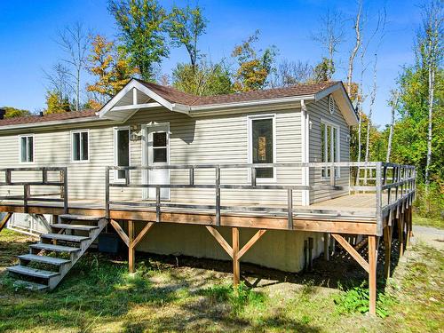 Face arriÃ¨re - 1305 Ch. Du Tour-Du-Lac, Saint-Aimé-Du-Lac-Des-Îles, QC - Outdoor With Deck Patio Veranda