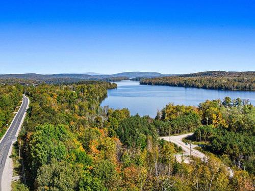 1305 Ch. Du Tour-Du-Lac, Saint-Aimé-Du-Lac-Des-Îles, QC - Outdoor With Body Of Water With View