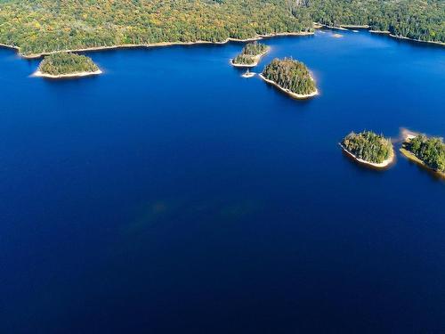 1305 Ch. Du Tour-Du-Lac, Saint-Aimé-Du-Lac-Des-Îles, QC - Outdoor With Body Of Water