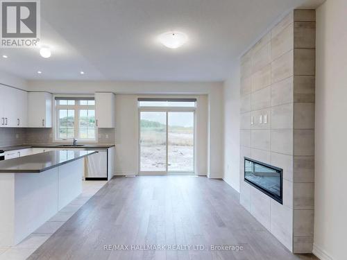 1104 Pisces Trail, Pickering, ON - Indoor Photo Showing Kitchen With Fireplace