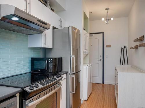 301-1007 Johnson St, Victoria, BC - Indoor Photo Showing Kitchen With Stainless Steel Kitchen