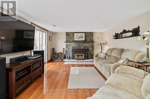 5884 7Th Line, New Tecumseth, ON - Indoor Photo Showing Living Room With Fireplace