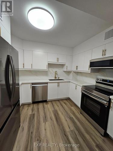 204 - 39 Kimbercroft Court, Toronto, ON - Indoor Photo Showing Kitchen