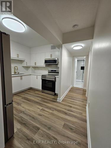 204 - 39 Kimbercroft Court, Toronto, ON - Indoor Photo Showing Kitchen