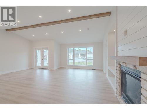 333 Sandhill Crescent, 100 Mile House, BC - Indoor Photo Showing Other Room With Fireplace