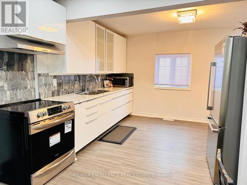 32 Rand Avenue W, Kirkland Lake, ON - Indoor Photo Showing Kitchen With Double Sink