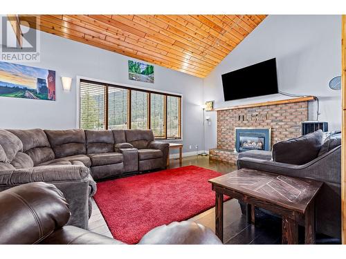 1021 Regina Street, Creston, BC - Indoor Photo Showing Living Room With Fireplace