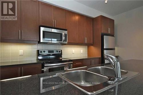 1404 - 1 Hurontario Street, Mississauga, ON - Indoor Photo Showing Kitchen With Double Sink