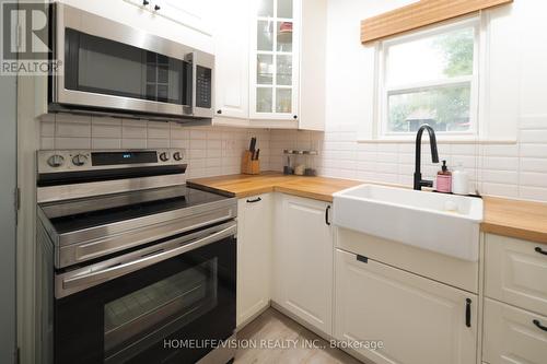 449 Rogers Road, Toronto, ON - Indoor Photo Showing Kitchen With Double Sink