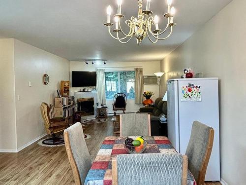 1-1876 Tranquille Rd, Kamloops, BC - Indoor Photo Showing Dining Room With Fireplace