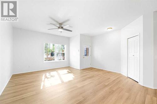 Sunny Living Room - 104, 141 Panatella Street Nw, Calgary, AB 