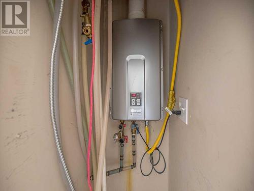 Tankless Water Heater - 104, 141 Panatella Street Nw, Calgary, AB 