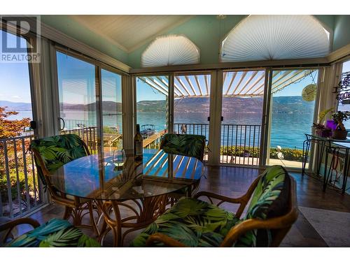 9123 & 9131 Westside Road, Vernon, BC - Indoor Photo Showing Dining Room With Body Of Water