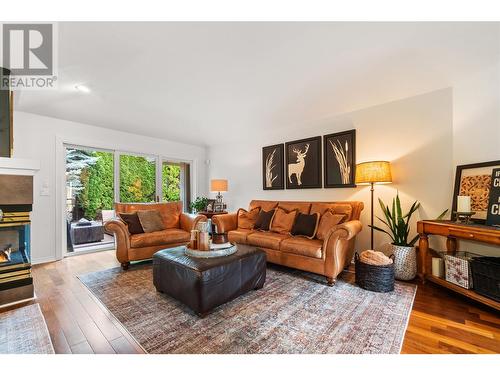 4222 Gallaghers Crescent, Kelowna, BC - Indoor Photo Showing Living Room With Fireplace