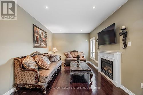 1674 Badgley Drive, Oshawa, ON - Indoor Photo Showing Living Room With Fireplace