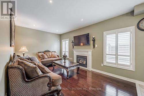 1674 Badgley Drive, Oshawa, ON - Indoor Photo Showing Living Room With Fireplace