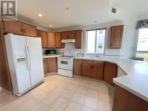 7801 Spartan Drive Unit# 215, Osoyoos, BC - Indoor Photo Showing Kitchen With Double Sink