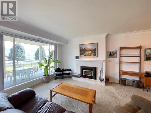 7801 Spartan Drive Unit# 215, Osoyoos, BC - Indoor Photo Showing Living Room With Fireplace