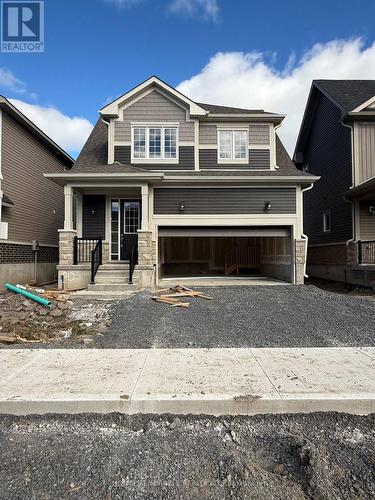 65 Golf Links Drive, Loyalist, ON - Outdoor With Facade