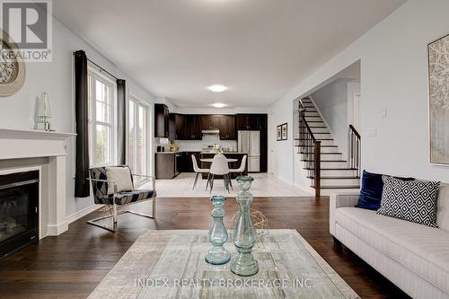 12 Steed Court, Cambridge, ON - Indoor Photo Showing Living Room With Fireplace