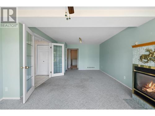 1116 Westridge Street, Creston, BC - Indoor Photo Showing Other Room With Fireplace