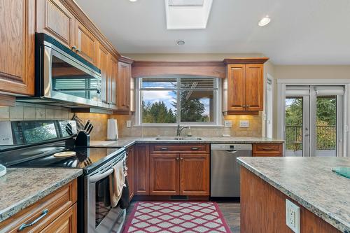 3311 Mcbride Road, Blind Bay, BC - Indoor Photo Showing Kitchen With Double Sink