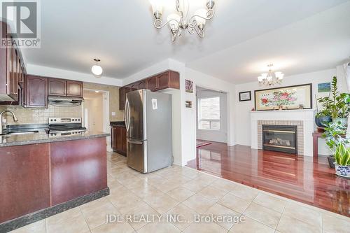 2609 Longridge Crescent, Oakville, ON - Indoor Photo Showing Kitchen With Fireplace With Double Sink