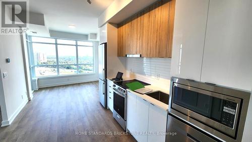 B1408 - 50 Upper Mall Way, Vaughan, ON - Indoor Photo Showing Kitchen With Stainless Steel Kitchen With Upgraded Kitchen