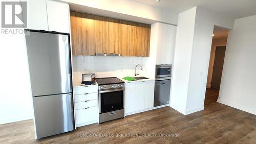 B1408 - 50 Upper Mall Way, Vaughan, ON - Indoor Photo Showing Kitchen With Stainless Steel Kitchen