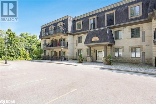 200 Collier Street Unit# 401, Barrie, ON - Outdoor With Facade