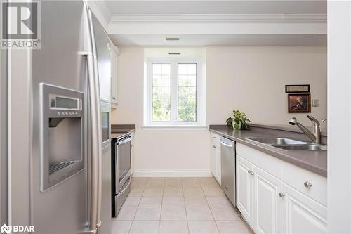 200 Collier Street Unit# 401, Barrie, ON - Indoor Photo Showing Kitchen With Double Sink