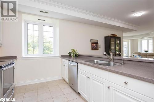 200 Collier Street Unit# 401, Barrie, ON - Indoor Photo Showing Kitchen With Double Sink