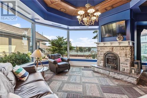 15 St Andrew Street Unit#1205, Brockville, ON - Indoor Photo Showing Living Room With Fireplace