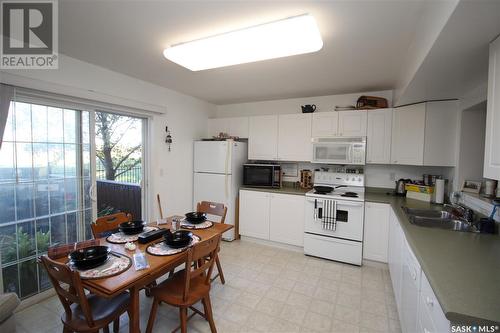 135 670 Kenderdine Road, Saskatoon, SK - Indoor Photo Showing Kitchen With Double Sink