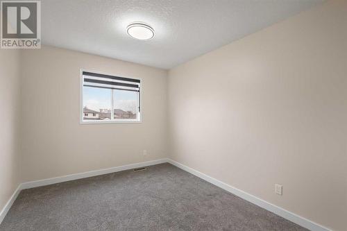 135 Mt Apex Crescent Se, Calgary, AB - Indoor Photo Showing Other Room