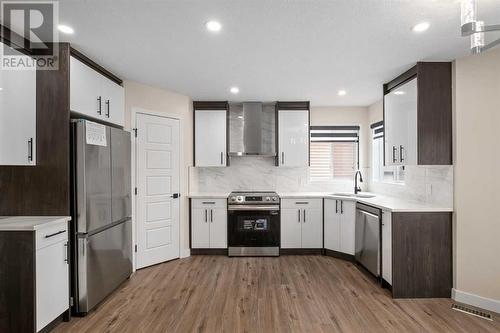 135 Mt Apex Crescent Se, Calgary, AB - Indoor Photo Showing Kitchen With Upgraded Kitchen