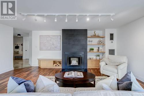 1102 - 280 Simcoe Street, Toronto, ON - Indoor Photo Showing Living Room With Fireplace