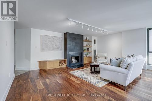 1102 - 280 Simcoe Street, Toronto, ON - Indoor Photo Showing Living Room With Fireplace