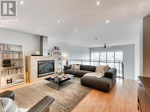 Ph616 - 160 Baldwin Street, Toronto, ON - Indoor Photo Showing Living Room With Fireplace