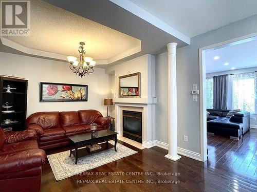 1411 Duval Drive, Mississauga, ON - Indoor Photo Showing Living Room With Fireplace