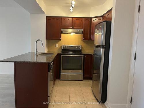 311-220 Forum Dr, Mississauga, ON - Indoor Photo Showing Kitchen With Double Sink