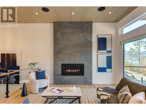 10198 Beacon Hill Drive, Lake Country, BC - Indoor Photo Showing Living Room With Fireplace