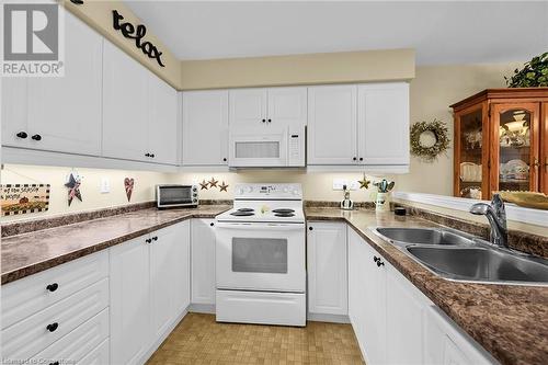 69 Mapleleaf Trail, Glanbrook, ON - Indoor Photo Showing Kitchen With Double Sink