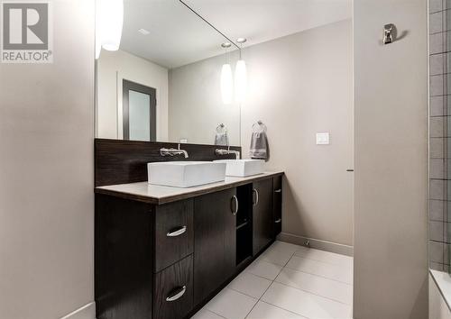 Double vanity ensuite bathroom with a huge shower - 901, 530 12 Avenue Sw, Calgary, AB 