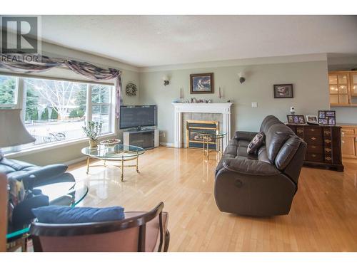 441 Bailey  Avenue, Merritt, BC - Indoor Photo Showing Living Room With Fireplace